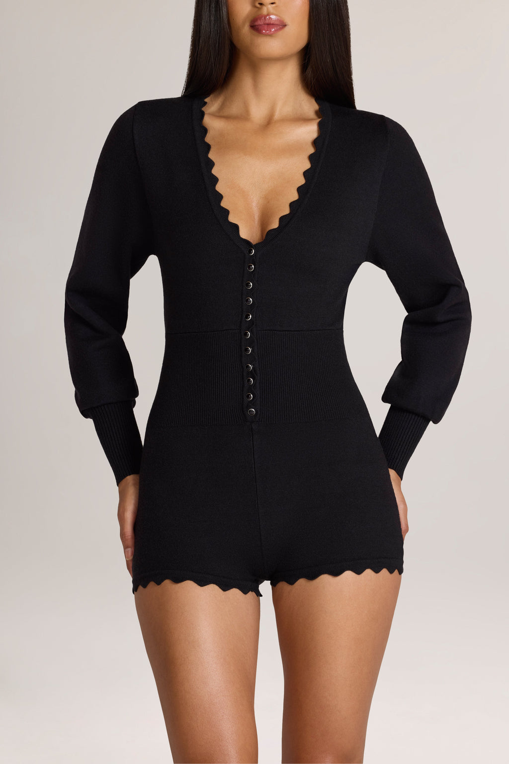 Knit Long-Sleeve Romper in Black