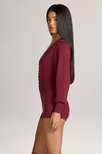 Knit Long-Sleeve Romper in Wine