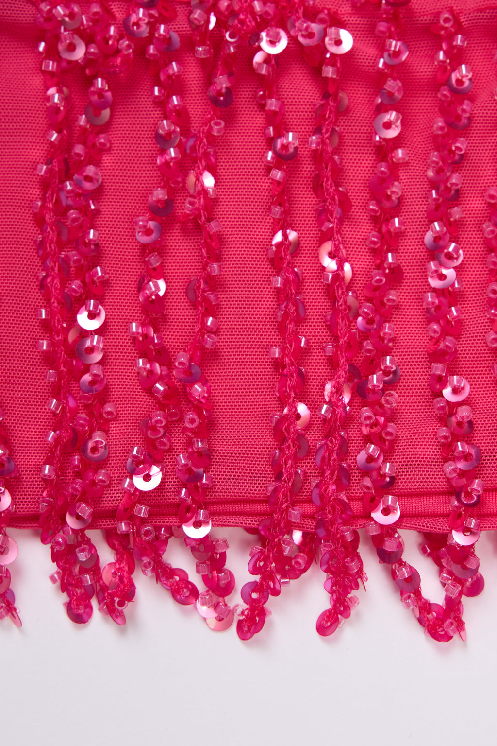 Fringed Low-Rise Mini Skirt in Raspberry