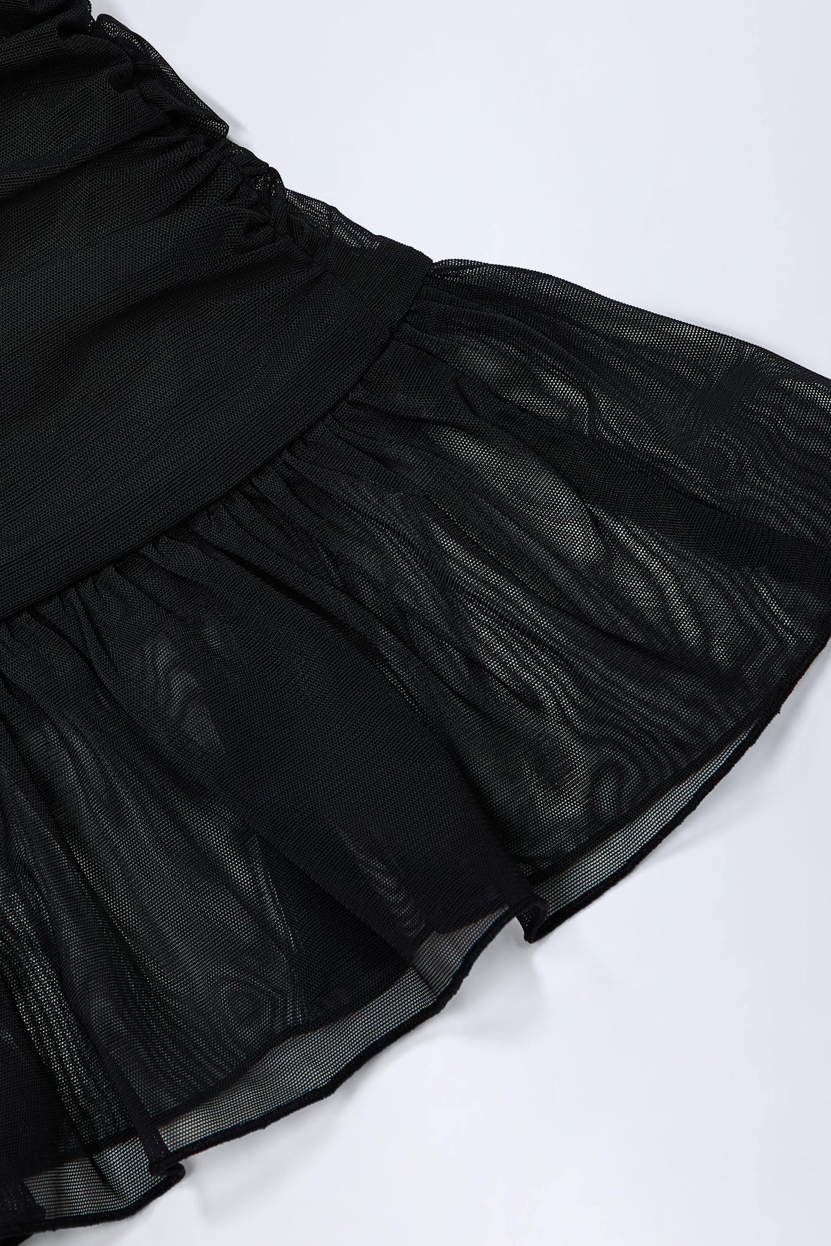 Hardware-Detail Ruffled Mid-Rise Mini Skirt in Black